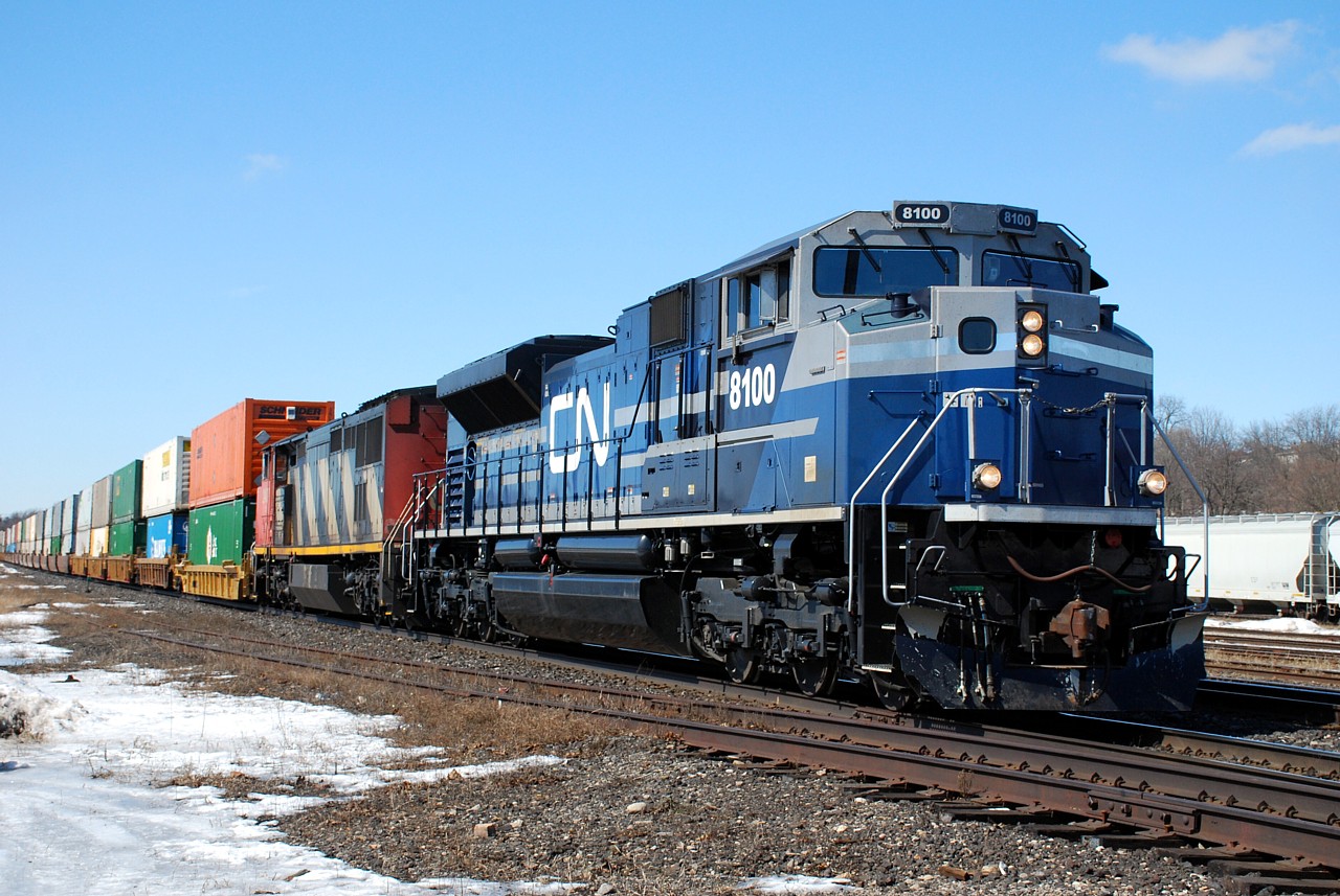 CN 8100 leads 148 past Brantford on a sunny but bitterly cold day. The fact that Spring is only three days away is hard to believe on a day like today. Thanks to those that provided the "heads up" on this train.