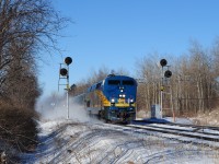 Via Rail GE (2001) P42DH #916 with J train # 52 – 62  splits the mile 319 intermediate signals at track speed.
<br>
<br>
(at least that GE is other than a  AC4400CW ! )
<br>
<br>
Track speed limit sign beside the (thirty three year old ) second LRC coach.
<br>
<br>
Almost shockingly significant March snow in the Carolinian Rouge Hill forest at minus 20C !!
<br>
<br>
March 13, 2014 image by S. Danko.
<br>
<br>
Same place, another age:
<br>
<br>
<a href="http://www.railpictures.ca/?attachment_id=2054">  same mile 319 </a> 
<br>
<br>
sdfourty.
