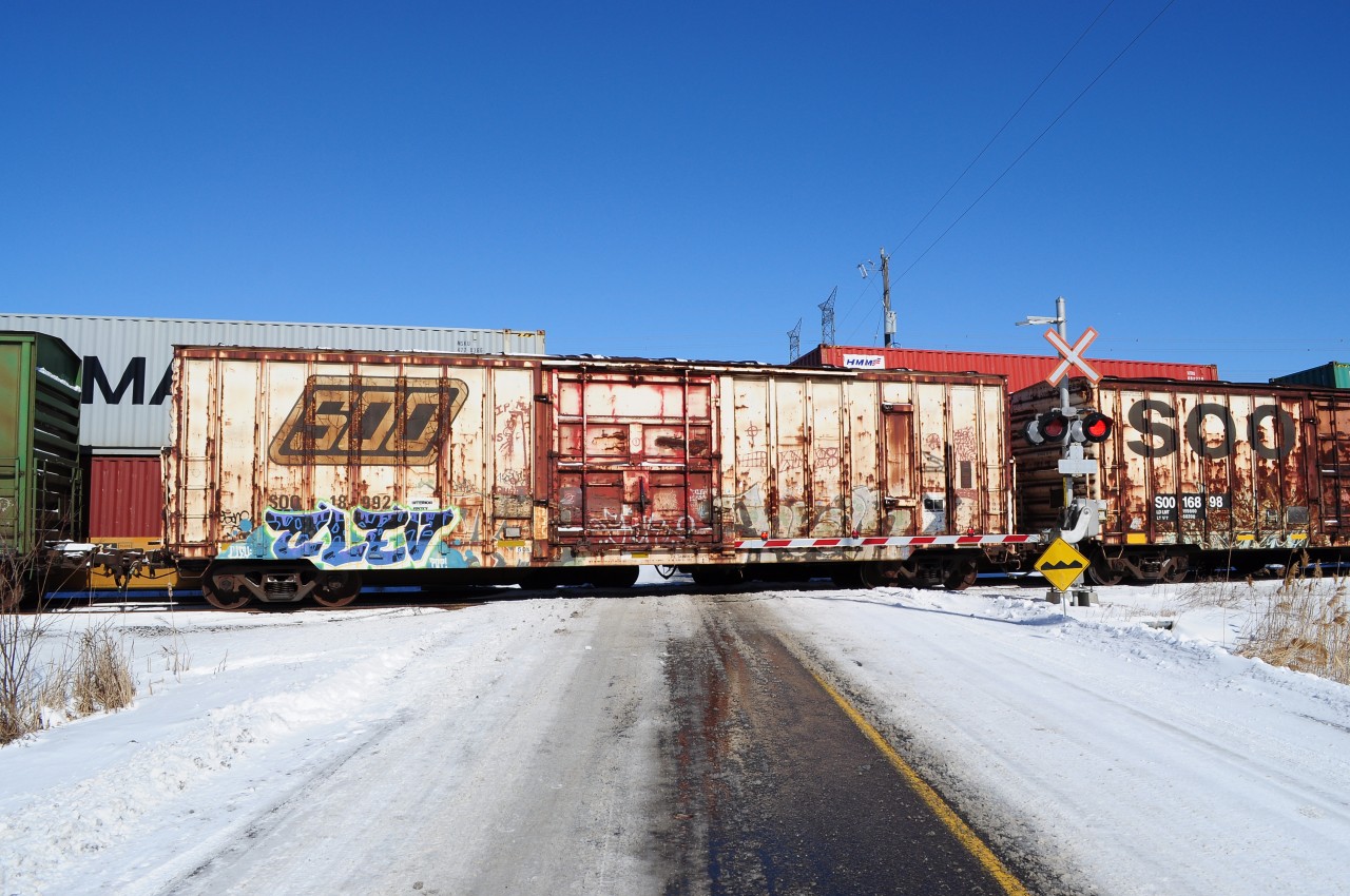 Question of the Day: 


That management trainee special: CP 8246 west with a string of sixty ( or so ) of ancient fifty foot reefers & boxes, primarily CP forest product and Soo Line reefers...all empties. 


The Soo Line reefers: SOO #18992 (SOO 16937 and 16889 also)  that auxiliary door, purpose ?


At Cherrywood, March 13, 2013 image by S. Danko. 


The 8246 west:


  8246 west  


sdfourty.