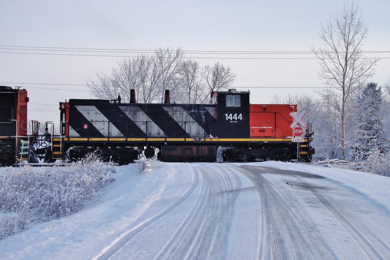 CN 1444 leads today's 438 at a sluggish speed of 10 mph through Maidstone on the now abandoned CASO. A fresh snowfall the night before made for nice photo conditions during this chase.