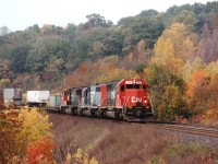 Dundas has always been a beautiful spot for getting fall colour images, as evident with this view of GTW 5930 (CN),GT 5921 and CN 5618 rolling eastward approximately mile 4.5 on the Dundas sub. The leader was former UP 4173, acquired by CN in 1990. the 5921 now retired and the trailing unit, an SD70I, was only a year or so old when this photo was taken.