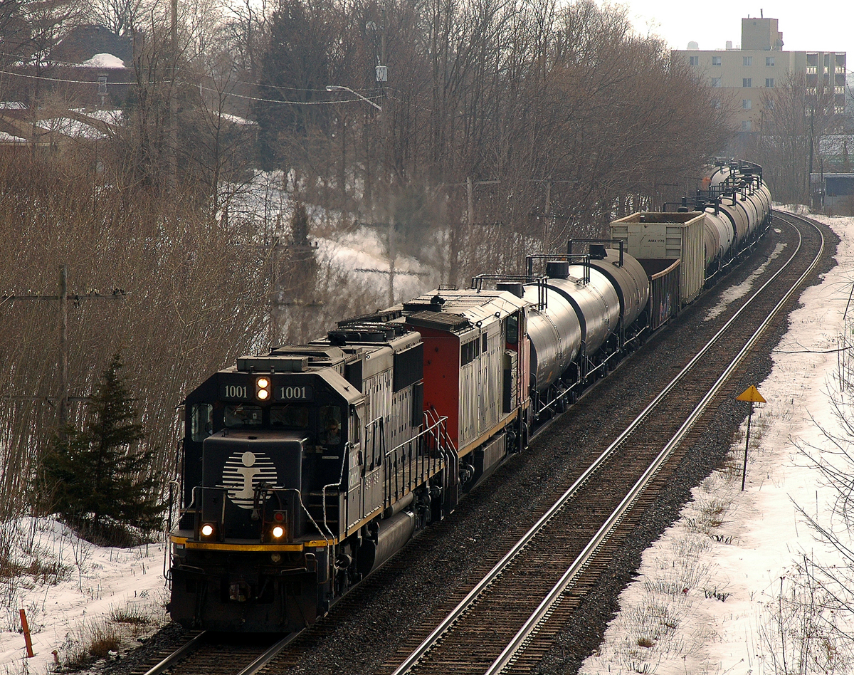 IC 1001 - CN 2428 leading 331 up the grade out of Brantford with 49 cars