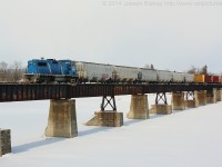 CEFX 2006 leads SOR 595 across the Grand River at Caledonia with a cut of cars from the local industries in town.