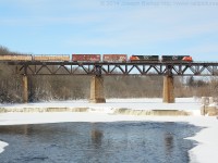 CN 2336 and CN 2109 lead train X332 across the Grand River in Paris.
