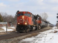 Kicking up some dust, CN 331 hits the Jordan crossover at 60mph with CN 5653, BNSF 1029 and a relatively short train mostly of tankers.