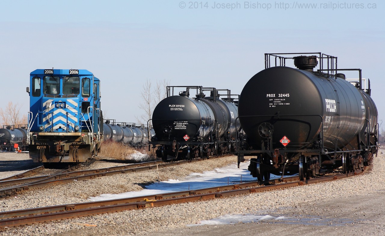 CEFX 2006 sits awaiting a crew at Garnet to start the days work of sorting tank cars to take to Imperial Oil in Nanticoke.  Note the track on the right hand side of the photo is the new yard track at Garnet, added this summer to handle the increasing number of cars the SOR handles.