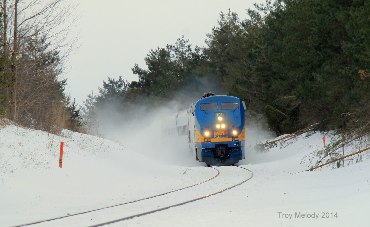 VIA 85, lead by P42DC 918 kicks up some snow as it approaches Mile post 47 of the Guelph Sub. Radio chatter was constant on this day due to track repairs between mile post 65 and mile post 82 of the Guelph sub.