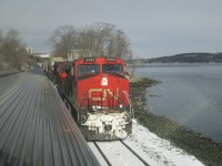 [Ed note: We'll accept this - can't expect perfection when shot through a dome window] In this photo aboard Via # 15 The Ocean on Assiniboine Park Car. Cn Q12011 meet via # 15 at bedford Subdivision in Bedford Nova Scotia. 