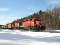 A nicely matched pair of SD-40-2's lead grain empties north approaching milepost 67. Apart from the plated over classification lights and relocated horns not much has changed from when these units were built in the 80's.