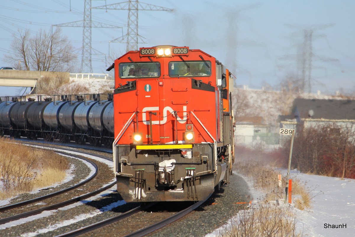 CN westbound with a thunder cab and a BNSF gevo behind !