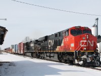 CN2315 and NS9548 hauling an eastbound freight on the south track in front of the old Ingersoll Station.
