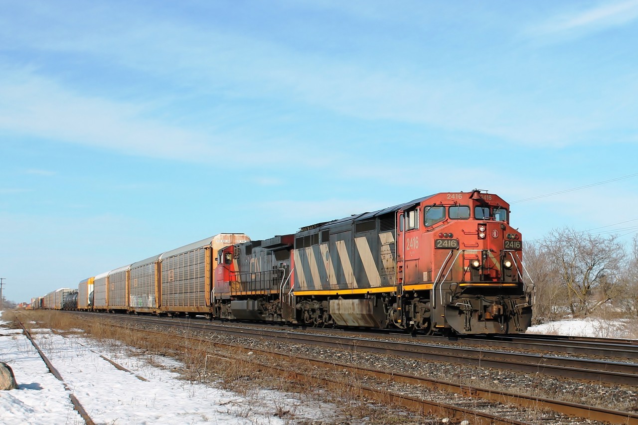 2416 and 2551 hauling I believe #148 eastbound on a nice spring morning.