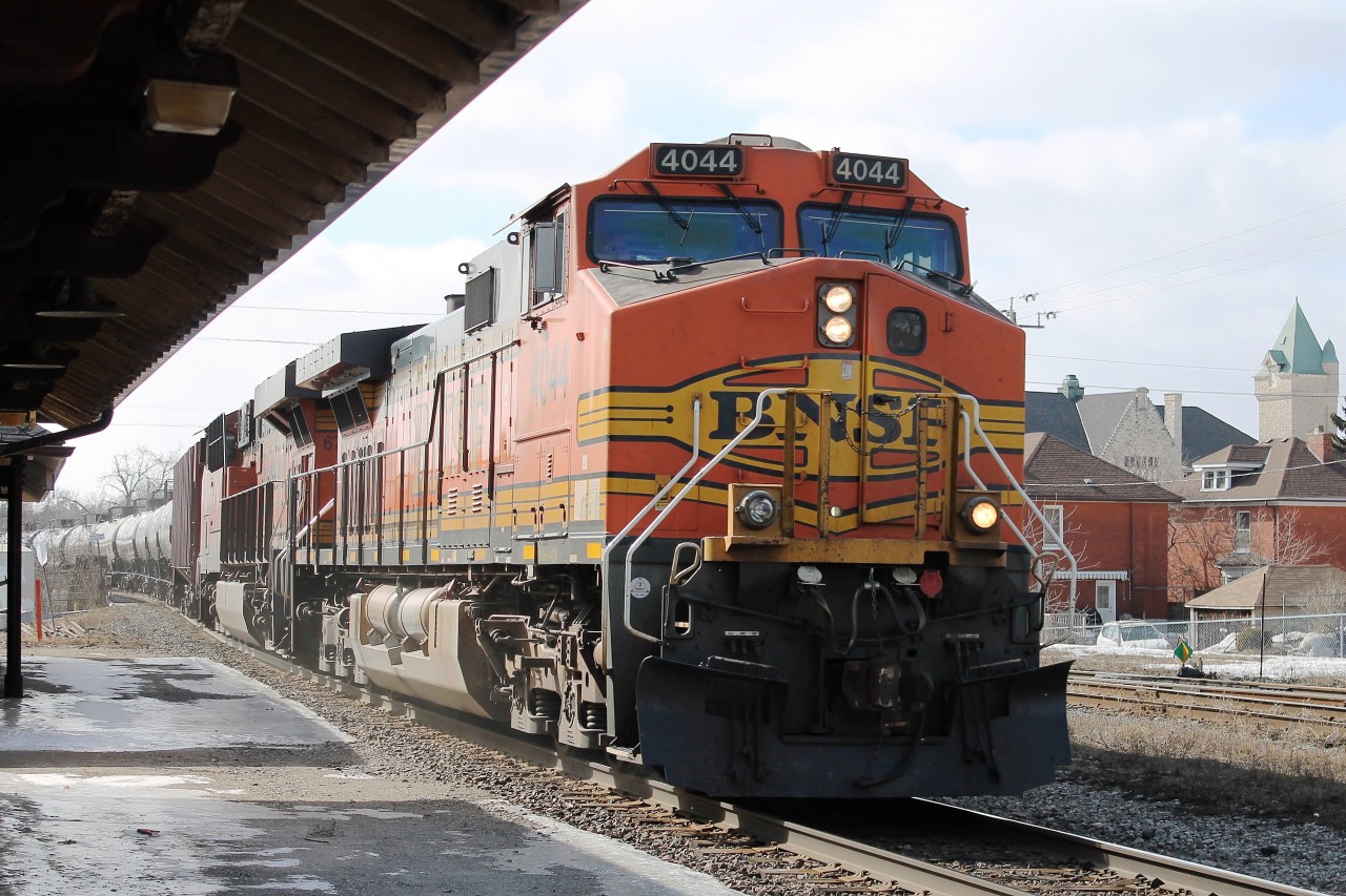 What a great day! Having dropped the wife and girls at the shopping mall it was 3 hours at Galt Station. I was lucky to at last see an oil train which was headed by BNSF 4044 BNSF 6735 and with an older liveried loco BNSF 8260 on the rear. Pictured here at the station as it leaves the Grand River bridge.