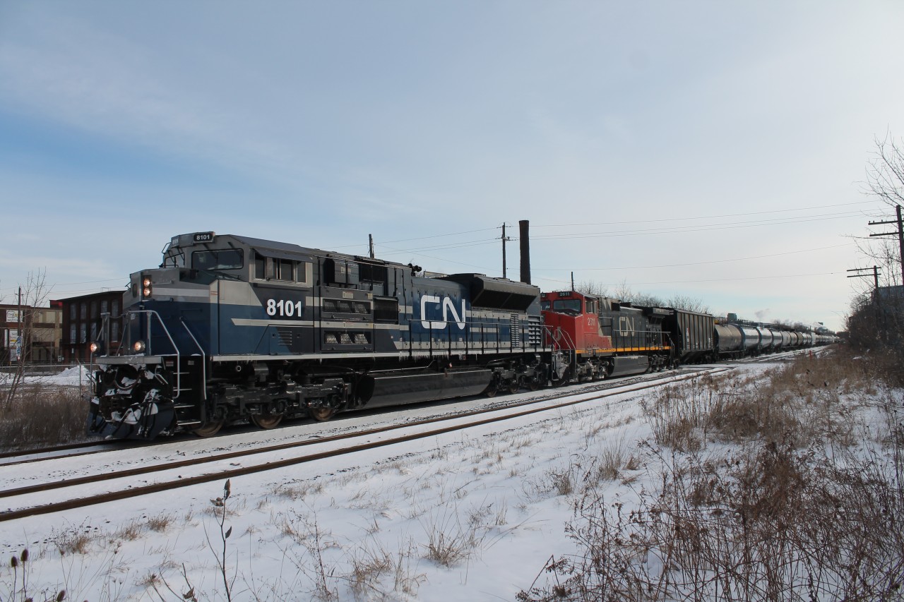 Just west of Sherman Ave 331 is seen on the approach to Hamilton yard where it will make a set-off and lift before leaving town for points west.