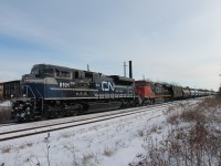 Just west of Sherman Ave 331 is seen on the approach to Hamilton yard where it will make a set-off and lift before leaving town for points west.