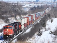 CN 102 passes by Knuckle Alley, now one of my favorite locations, with a pair of SD75I's, hauling a nice intermodal train to BIT.