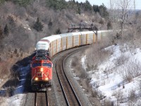 In the sunny March weather, preparing for tomorrows -19 weather, I am able to go film a few trains at the Hilda road bridge, here is my 2nd and final catch, 373 heading west with a 3 unit lashup, 5764, IC 1012, and a SD70M-2 behind that. Although there could have been more trains, it was a fairly decent day out today.