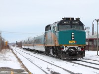 A rebuilt VIA F40PH-3 arrives at Dorval VIA station dropping off passengers and meeting a westbound with the class leading 900 in lead. 