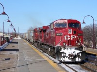 CP 302, a grain train passes Dorval AMT station with 2 AC4400CWs "toasters". The train arrived at its destination, at Montreal, QC minutes later. Defiantly,yesterdays 302's power was better, UP leading and UP as DPU. They returned on 301 later that day packed between a GE and EMD, but unfortunately I didnt get a photo of them. 
