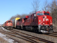 CP 147 passes stopped CP CWR (Rail Train) on the left. Behind is 255 with FPON.