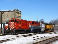 Former CP comrades OSR 8235, and a bit less obvious, RLK 2211 have the day off along with LLPX 2236 as they idle on the shop tracks out front of the VIA/GO station in Kitchener. Note that the main in the foreground has been redirected through a shoo-fly around the Duke street underpass construction project, and the passing track has been severed. 