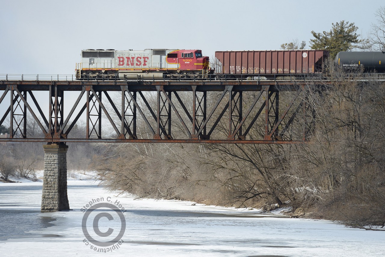 For the first time in Ontario BNSF DPU crosses the border into Canada on an oil train, seen at Galt, Ontario. This SD75M was built at London, Ontario - welcome home, BNSF 8260.