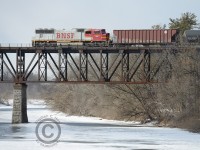 <b>For the first time in Ontario</b> BNSF DPU crosses the border into Canada on an oil train, seen at Galt, Ontario. This SD75M was built at London, Ontario - welcome home, BNSF 8260.
