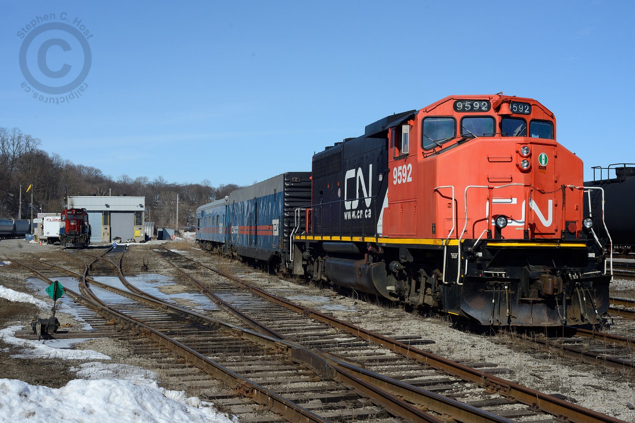 CN's Test Train parked by the SOR/CN Shop (Built 1964) at Hamilton, Ontario Yard. The crew is on-board (Including fellow RP.CA contributor - Michael DaCosta, CN Conductor) and is about to depart - todays task - test Tracks 1 2 and 3 between Bayview and Burlington West, then head to Fort Erie.