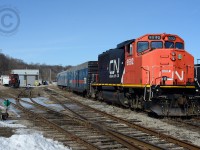 <b>CN's Test Train</b> parked by the SOR/CN Shop (Built 1964) at Hamilton, Ontario Yard. The crew is on-board (Including fellow RP.CA contributor - Michael DaCosta, CN Conductor) and is about to depart - todays task - test Tracks 1 2 and 3 between Bayview and Burlington West, then head to Fort Erie.<br>Photographed with 50mm f/1.8 (Thrifty Fifty)