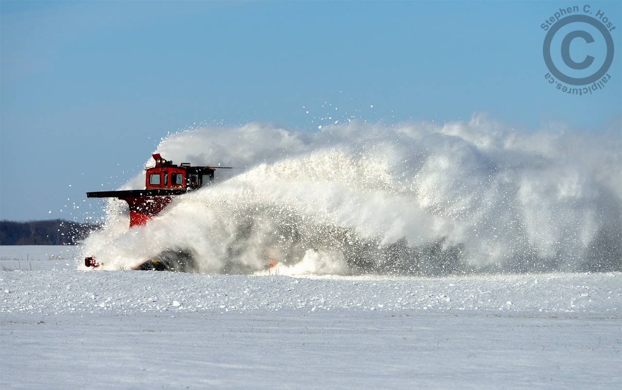 Winter gave us a blast of snow yesterday here in Ontario, and to celebrate what may be the last OSR Plow run of 2014(which was Today) I present this photo of the venerable 401005 doing what it does best.
Interested in a print of this image? For a limited time, you may order one here
