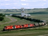 Northbound CP grain pickup tramp from Coronach to Assiniboia departs Rockglen in the beautiful West Poplar River Valley
