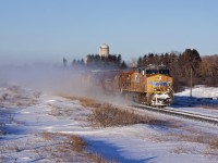 <b>FPON!</b> UP 5538 charges east just after sunrise with grain loads destined for Quebec.