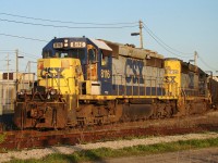 CSX train D718 is departing the Electric Yard with two SD40-2's and 19 cars. He brought 50 cars over from Rougemere Yard in Dearborn MI. (Canadian crew) earlier in the afternoon and is seen here at 19:20.