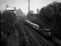 An empty 698 thunders under the Strachan Ave. overpass enroute to the VIA TMC.