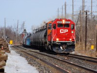 For a sunday, the CP Galt Subdivision was very quiet. Luckily, one of the few trains that made it's way through was CP 242 with a class leading refurbished ex. SOO, (CP 6221 ex. SOO 6021). If the class leader wasn't enough, this train also had BNSF 6619 in second. Quite an interesting consist indeed!