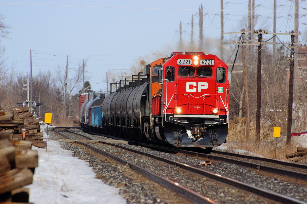 For a sunday, the CP Galt Subdivision was very quiet. Luckily, one of the few trains that made it's way through was CP 242 with a class leading refurbished ex. SOO, (CP 6221 ex. SOO 6021). If the class leader wasn't enough, this train also had BNSF 6619 in second. Quite an interesting consist indeed!