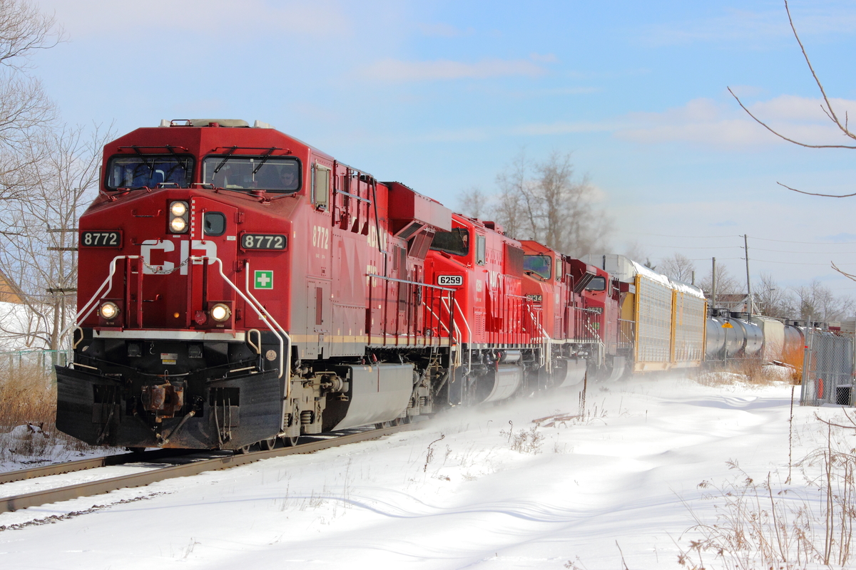 After railfanning at 2 different locations on the CN York Subdivision, Max and I decided to take a risk and head to a neat location on the MacTier Subdivision. After a bit of a wait, our train hits a detector and not too long after, it comes rolling by with some fantastic power!