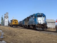 2238 heads back out onto the main line after spotting a box car. It will then spot the 4255 into the same siding before continuing to Stoughton.