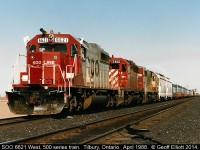 With Train #500, SOO 6613 east, on the way we find the third 500 series train of the day sitting in the siding in Tilbury.  Here SOO SD40-2 #6621 has a westbound 500 series train in the siding waiting on the SOO 6613 to roll on by.  Miss the days when you could shoot the 500's and catch great power lashups like these on a daily basis.