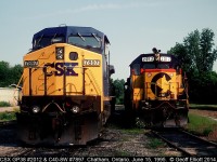 Faces of change sit in the sanding tracks at the old C&O engine service facility in Chatham, Ontario back in 1995.  The 7897 was in town as it had come over on an empty grain extra that was delivered to W.G. Thompson in Blenheim.  The local crew brought the unit back to Chatham for 'safe keeping' I guess.  In 1995 it was nice to shoot the big CSX GE's as they were still 'the new thing' at the time.  Today I could care less about seeing another GE, and would pay good money to shoot a nice set of GP's on a road train.......