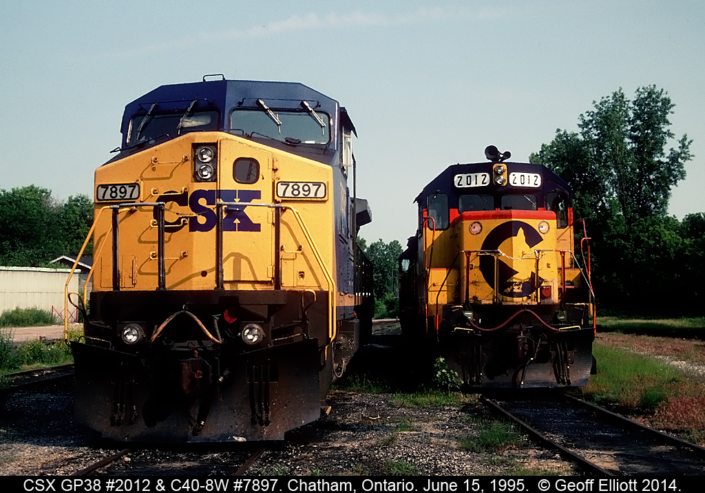 Faces of change sit in the sanding tracks at the old C&O engine service facility in Chatham, Ontario back in 1995.  The 7897 was in town as it had come over on an empty grain extra that was delivered to W.G. Thompson in Blenheim.  The local crew brought the unit back to Chatham for 'safe keeping' I guess.  In 1995 it was nice to shoot the big CSX GE's as they were still 'the new thing' at the time.  Today I could care less about seeing another GE, and would pay good money to shoot a nice set of GP's on a road train.......