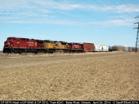 CP 8579 leads train #241 as it approaches Belle River with UP SD70ACe #8640 and CP GP38AC #3012 to round out a colorful elephant style trio on April 24, 2014.