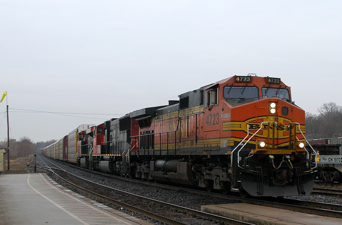 This ain't no game....BNSF 4723 - CN 5600 - CN 2279 provide the horses for 332 pulling 110 cars