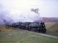 Upper Canada Railway Society excursion trips on Saturday and Sunday, September 26 & 27 1964, were a doubleheader run and done with CNR Northerns 6167 and 6218. This was to show the change of excursion engines from 6167 to 6218, as 6167's boiler tubes needed to be retubed in October 1964 (next month) which would prevent it from continuing in excursion service. On September 26th, the train ran from Toronto to Huntsville ON and back, departing from Union Station, heading north via the Bala and Newmarket Subs, and returning to Toronto via the Newmarket. The train is shown here on one of its runbys north of Washago, heading south on the Newmarket Sub near present-day Gravenhurst.
<br><br>
6167's final excursion run would be from Toronto to Brantford and back the next day. She would be stored at Spadina Roundhouse before being donated to the City of Guelph three years later to be <b><a href=http://www.railpictures.ca/?attachment_id=2905>put on static display</a></b> near the CN (now VIA) Station. CN 6218's final excursion was in 1971, and it is now <b><a href=http://www.railpictures.ca/?attachment_id=10469>on display in Fort Erie ON</a></b>.