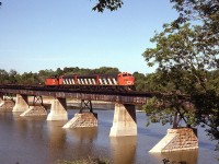 Rolling east over the Grand River bridge in Caledonia, CN 9173 leads her matching A-B-A set of zebra F7's eastbound on the Hagersville Sub on the Steel Train.<br><br><b><i>CN Steel Train on same day:</i></b><br>Crossing in Caledonia: <b><a href=http://www.railpictures.ca/?attachment_id=14684>http://www.railpictures.ca/?attachment_id=14684</a></b><br>Rymal outside of Hamilton: <b><a href=http://www.railpictures.ca/?attachment_id=14618>http://www.railpictures.ca/?attachment_id=14618</a></b>