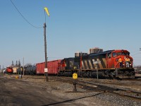Andy brings a pretty long CN 509 into the yard at London East with the conductor and yardmaster riding on the pilot with CN 5513-IC 1012 for power. CN GMD-1 1444 rests at left on the shop track.