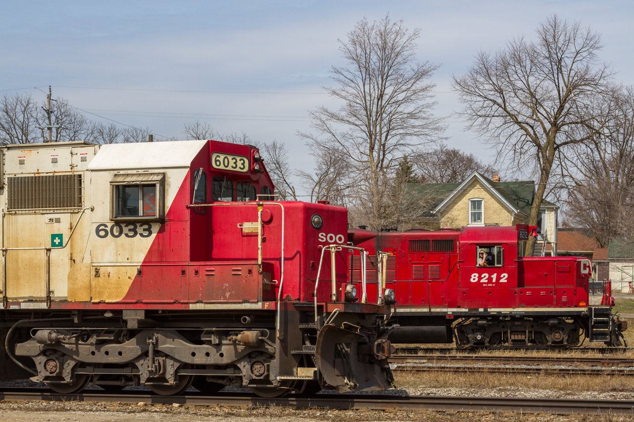 What year is it again? Almost like days gone by, SOO 6033 meets CP 8212 in Galt, Ontario. Both of these units are true veterans in their own right, the SOO having avoided the SD60 rebuild program and the CP from the ECO unit rebuild program.
