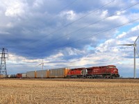 CP 8821 with multi-marked CP 5749 work eastward with train 234 at mile 88.1 on the CP's Windsor Sub.