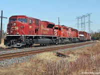 With respect to James Adney's shot of CP 9104, one of the four remaining operable SD90MAC's, CP 9157, leads 301's train past Cherrywood siding in the company of SD40-2 survivors 6069 and 5746. 1333hrs.