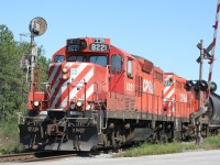A look back to August 2008. CP 8221 and another geep lead the Ham Turn westward. Why the gates were still up, I'm not sure. This was taken at Clyde Rd. level crossing at ESS Killean.